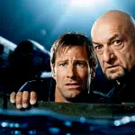 ‘Deep Water’ Review: Renny Harlin’s Double-Dip Disaster Movie — Plane Crash + Shark Thriller —  Has His Signature Schlock Touch